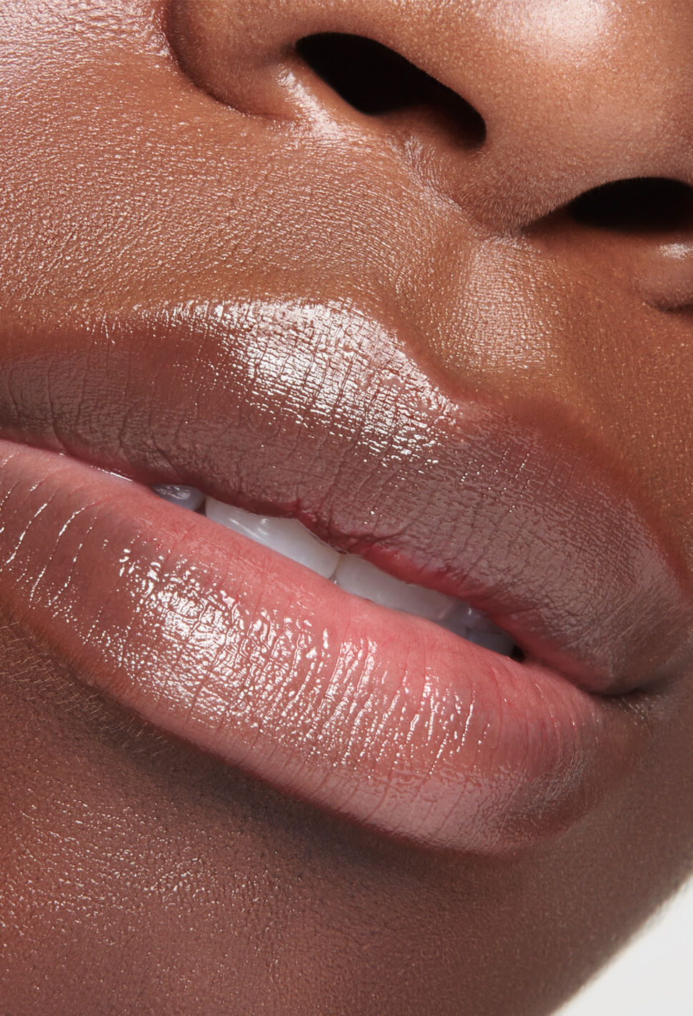 Close-up of woman's slightly parted moisturized lips