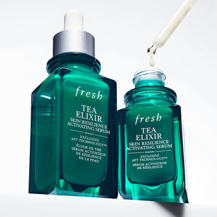 Fresh's advent calendar gift set open to display a selection of products against a light blue background