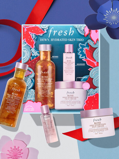 fresh skincare holiday gift set with red ribbon