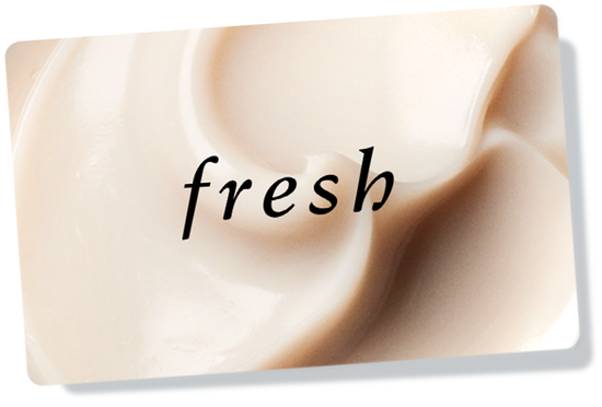 Patterned Fresh gift card overlaid on top of red ribbon against a white background.