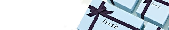 Fresh blue gift boxes of different sizes arranged in a square on a white background.
