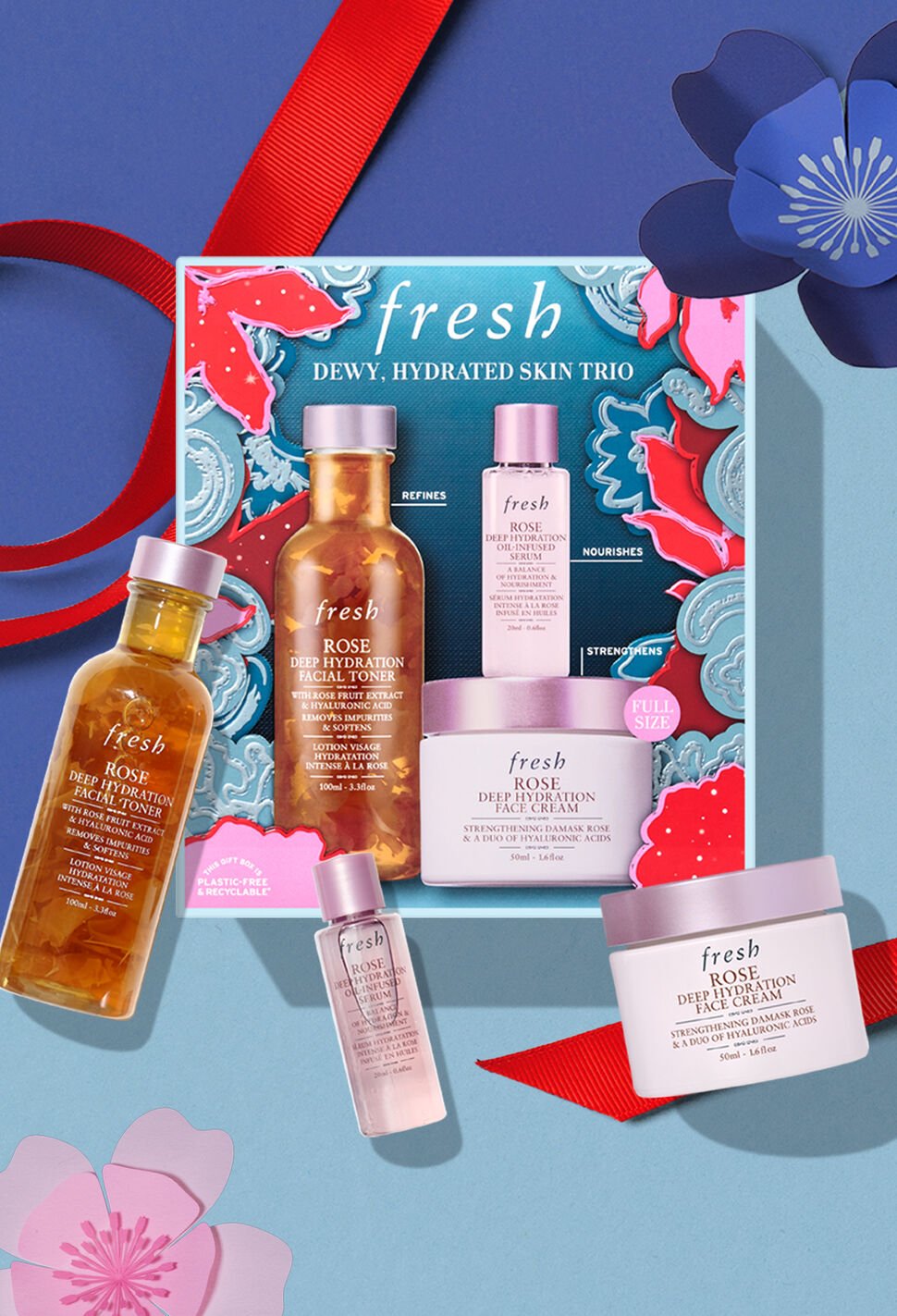 fresh skincare holiday gift set with red ribbon