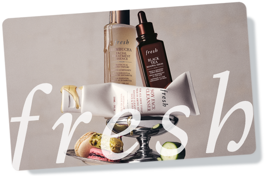 Patterned Fresh gift card overlaid on top of red ribbon against a white background.