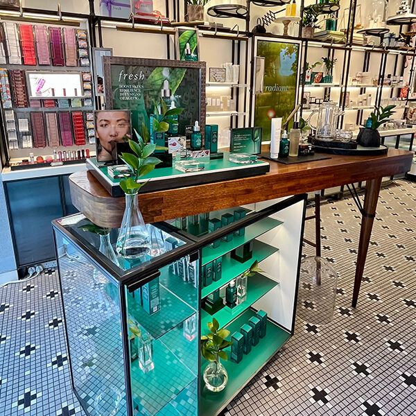 A shop with a product counter selling a range of Fresh Beauty products